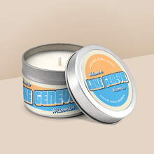 Load image into Gallery viewer, Lake Geneva soy candle in a 4 oz travel tin, from the Wanderlust Wisconsin Collection by Angela Rose Studios.